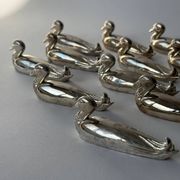 18 porte-couteaux en métal Canard