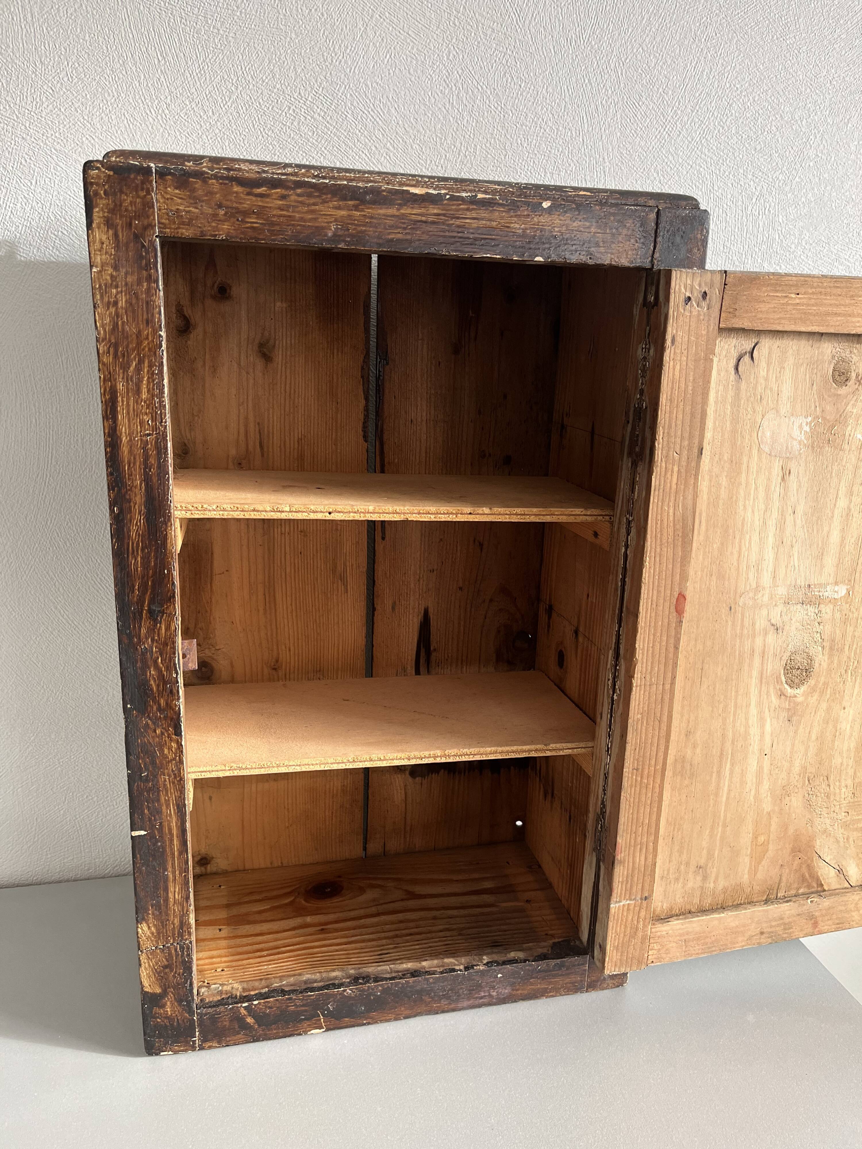 Patinated wooden toilet cabinet / pharmacy