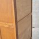 Armoire pied compas en chêne blond