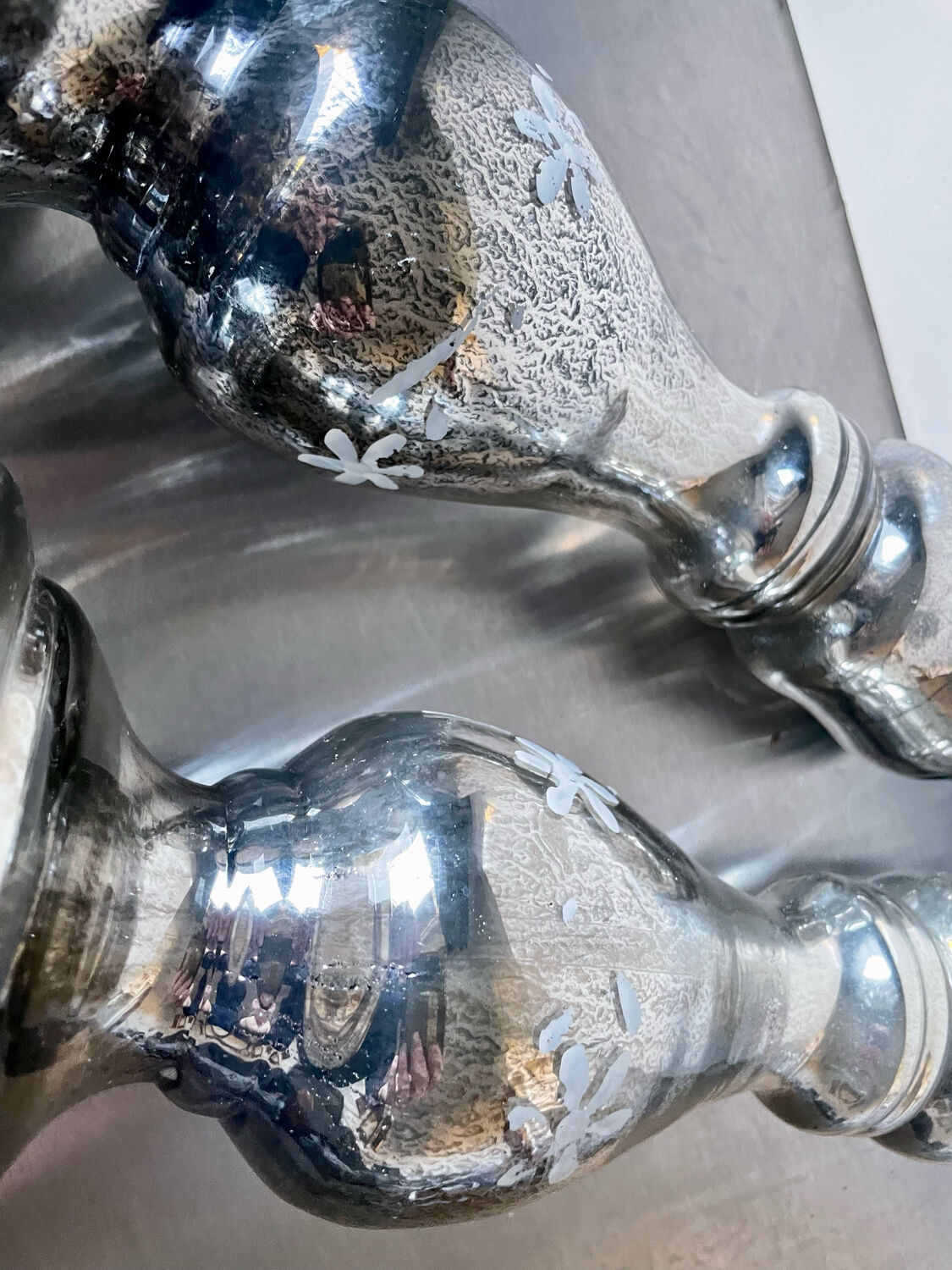 Pair of vintage mercury glass candleholders