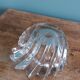 Shell-shaped crystal paperweight.