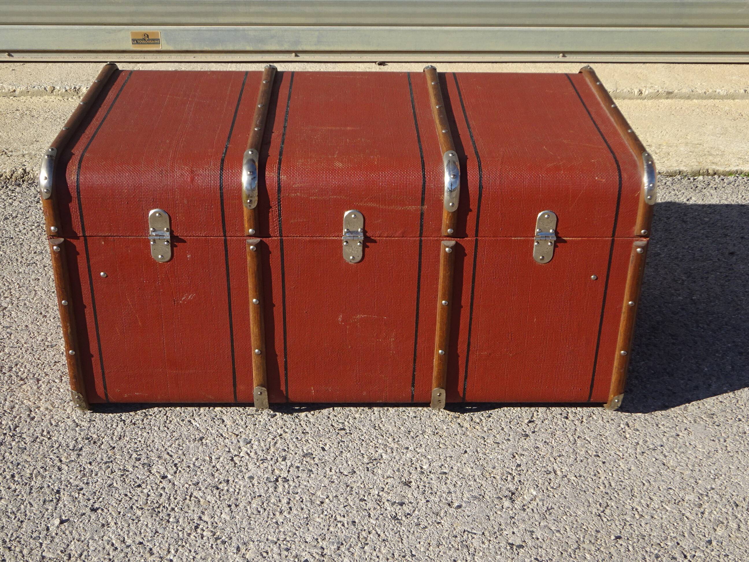 Old curved travel trunk