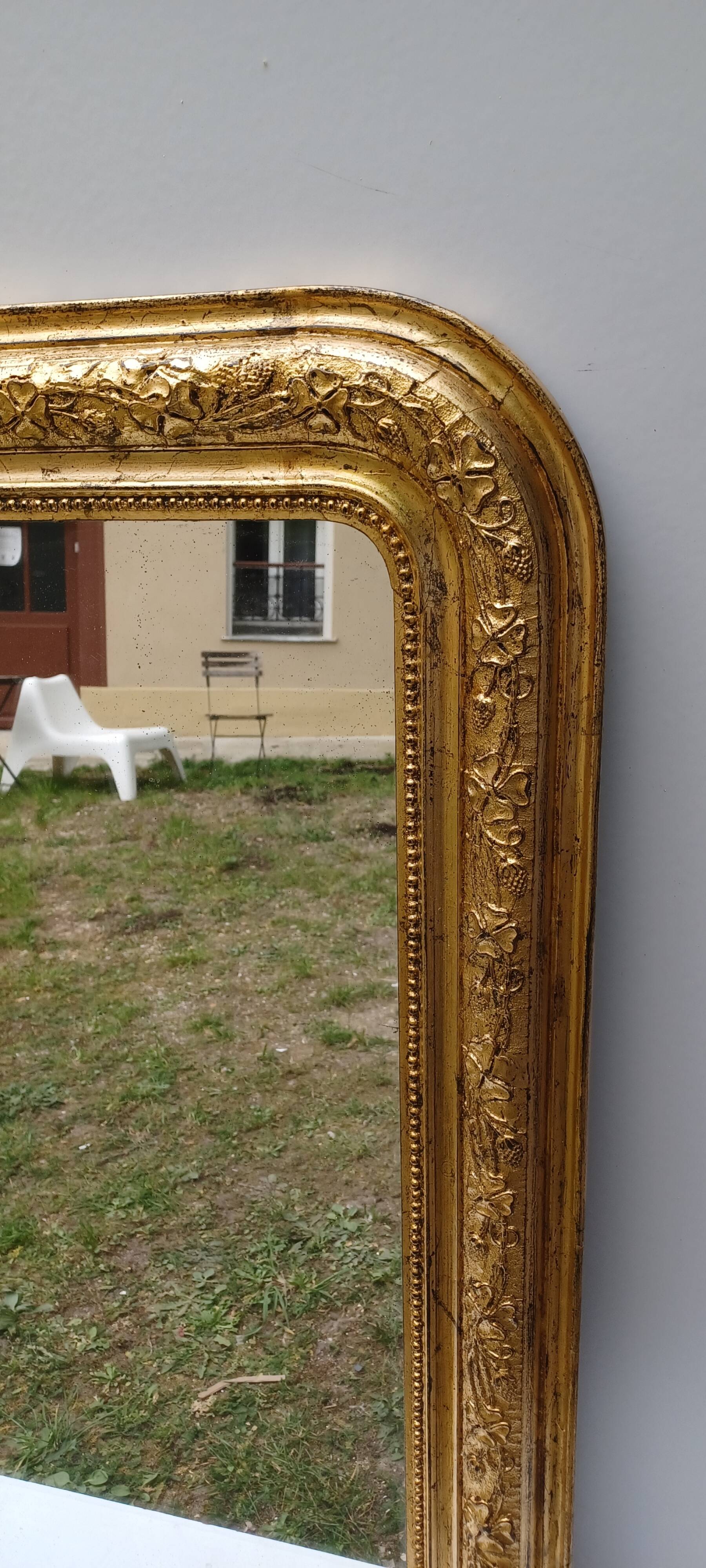 Golden mirror in louis-philippe style around 1870