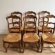 Set of 6 traditional chairs made of solid wood and straw.