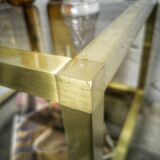 Golden side table and smoked glass