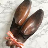 Pair of old solid wood shoes