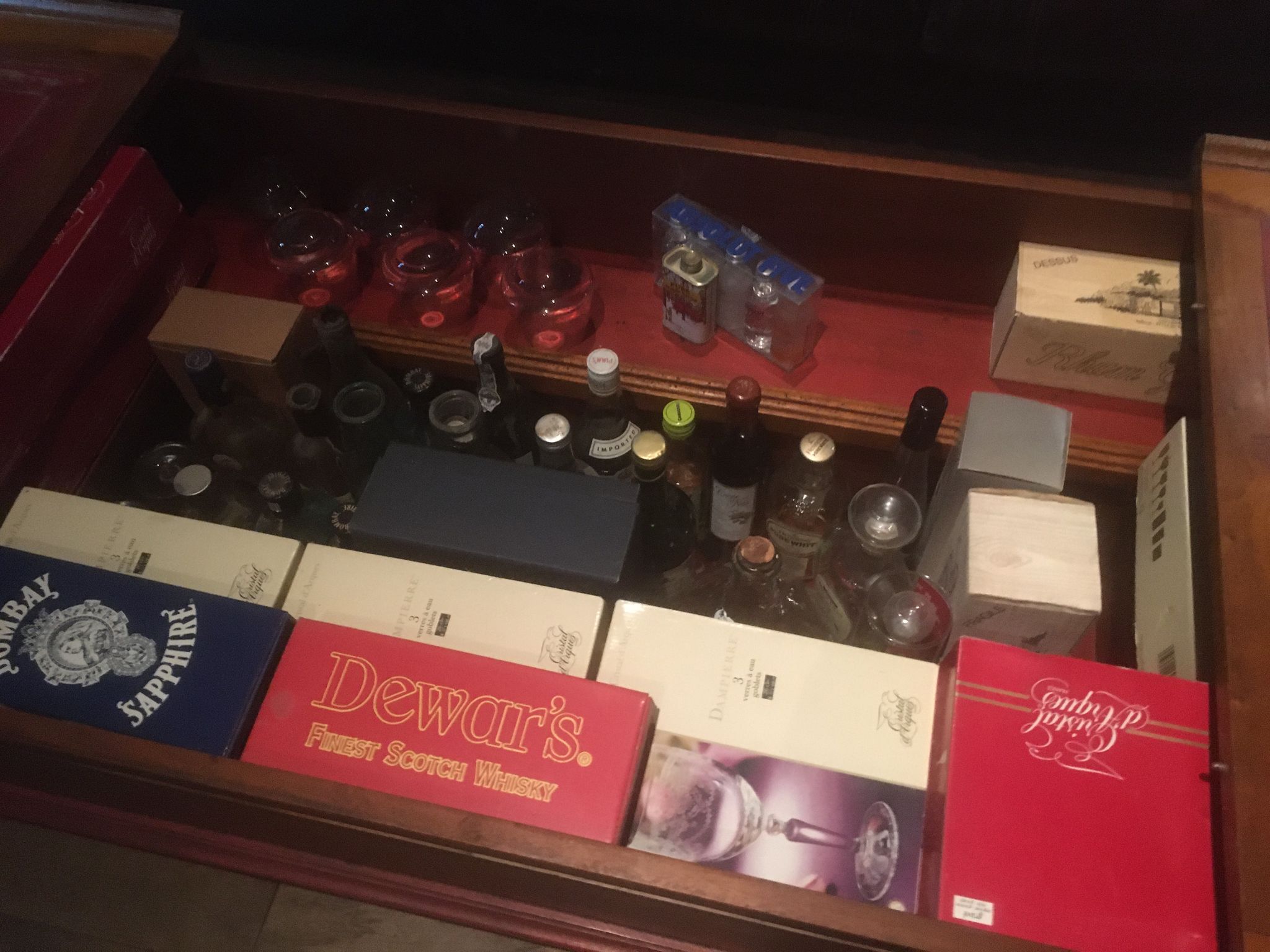 Coffee table with storage for bottles and glasses in oak.