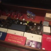 Coffee table with storage for bottles and glasses in oak.