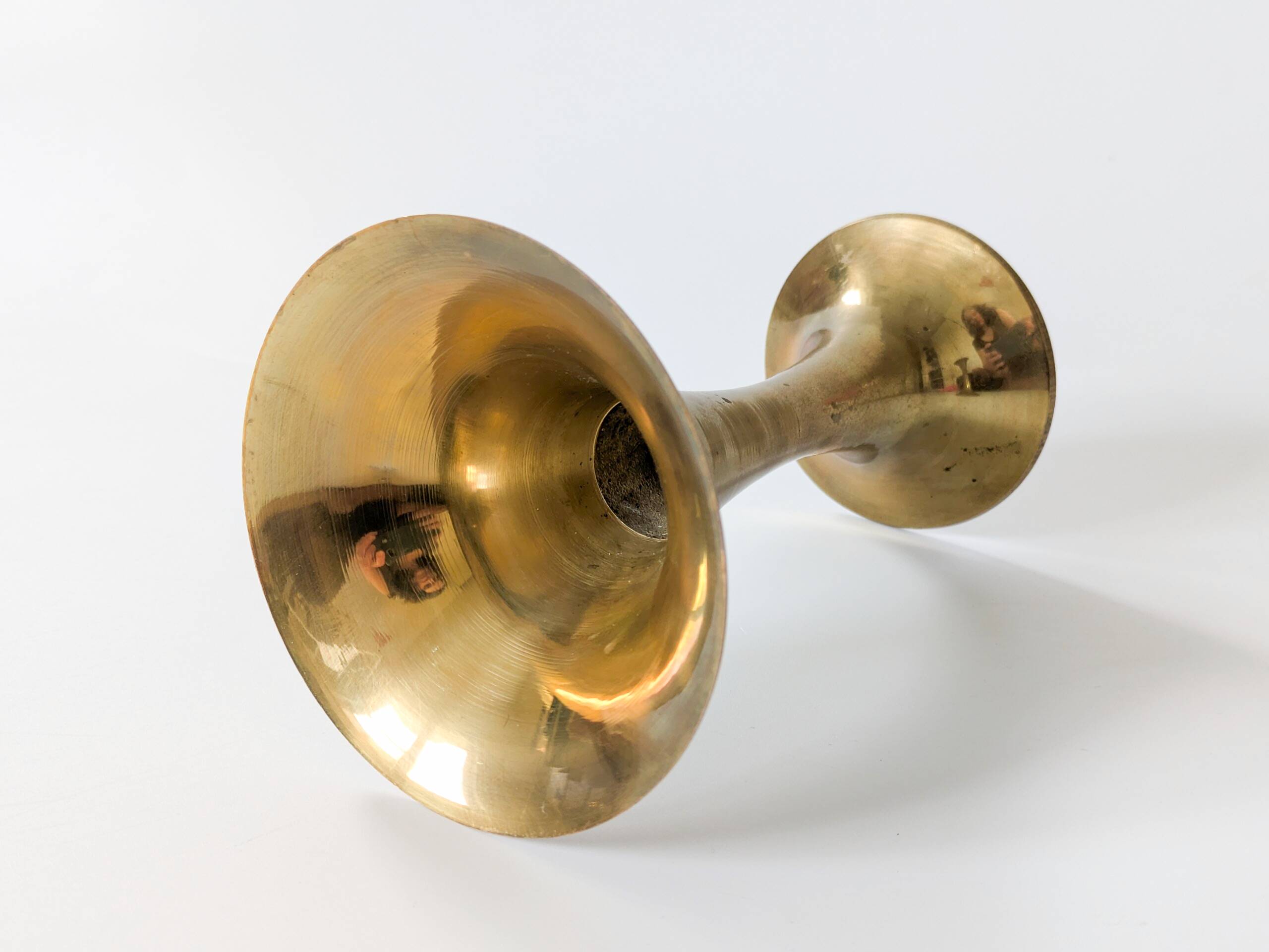 Pair of Midcentury brass candlesticks, flared shape.