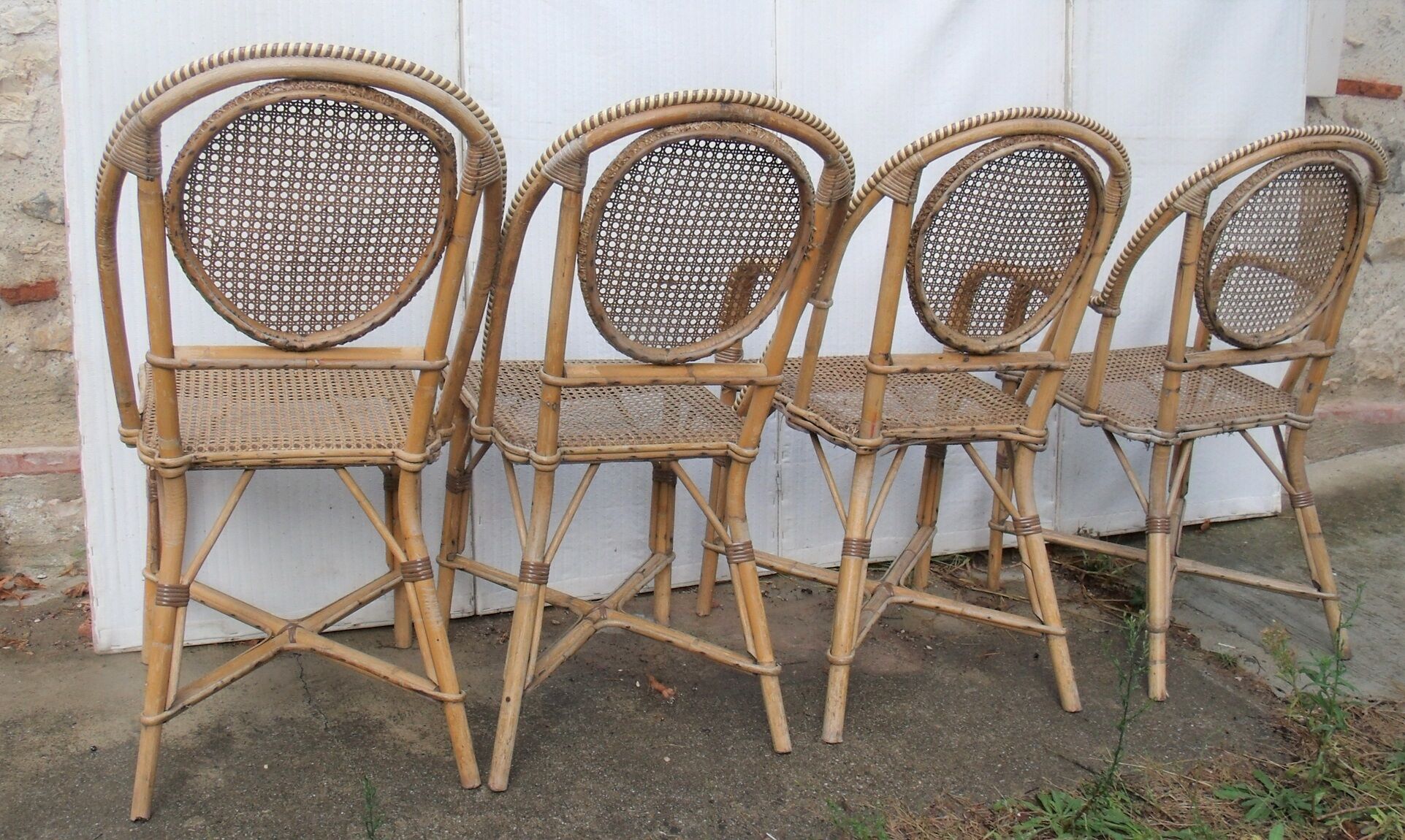Set of chairs and cannate armchairs of bistro terasse de bar