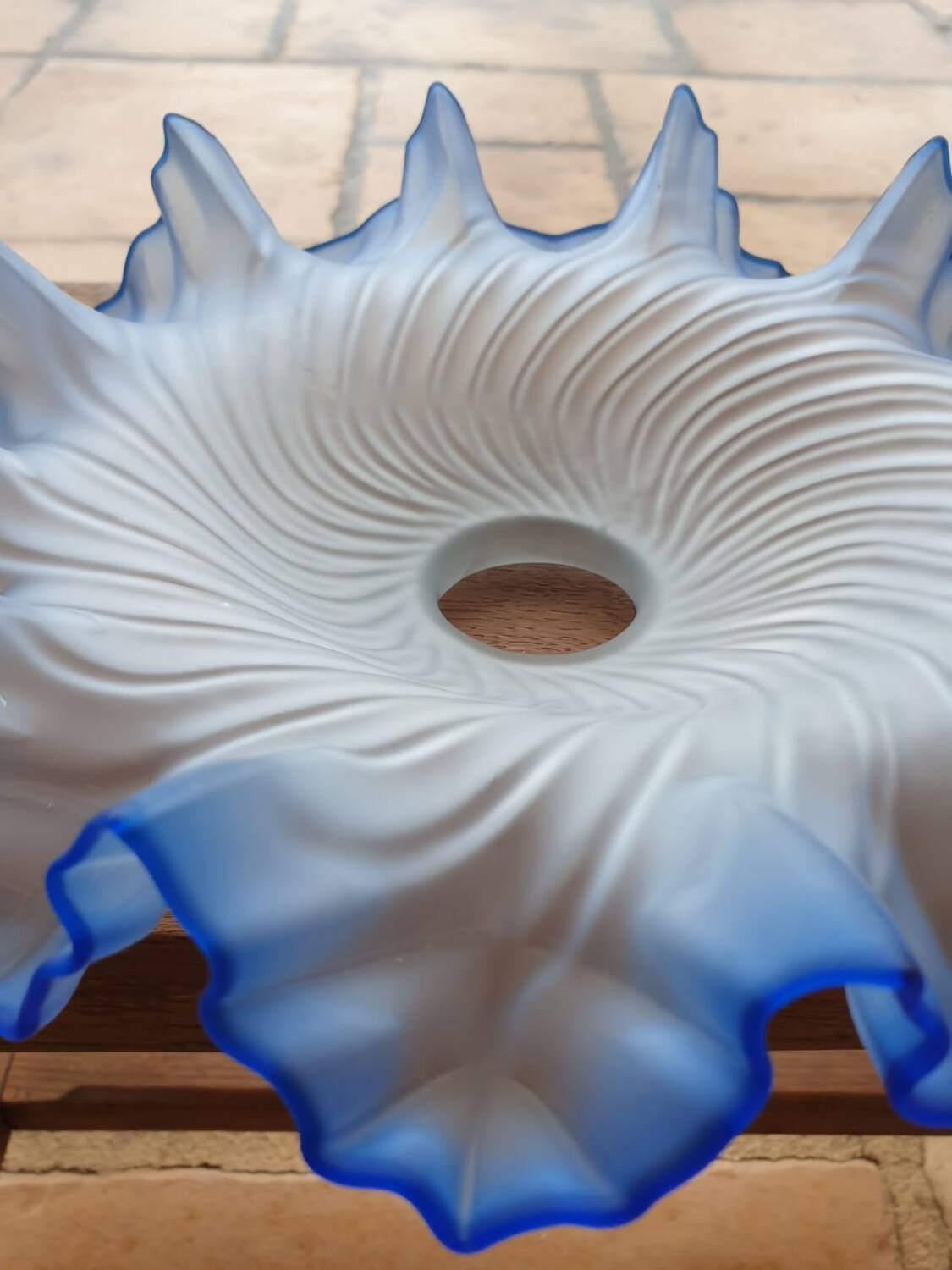 White and blue skirted opaque glass lampshade