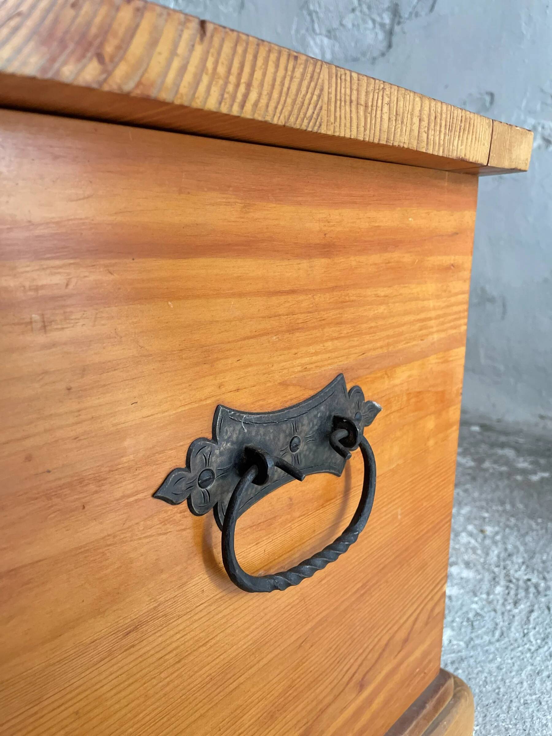Swiss solid pine chest with wrought iron fittings, mid-20th century.