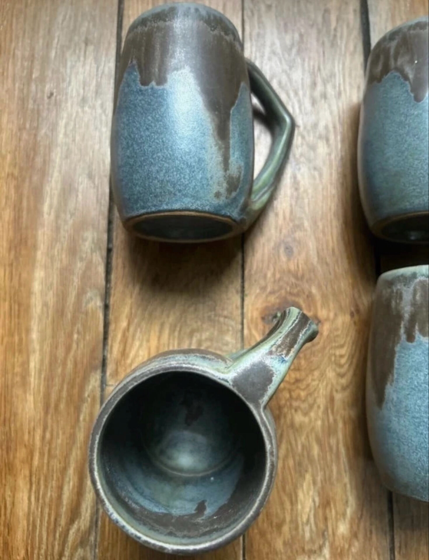 Set of 4 cups and 1 signed brutalist tray.