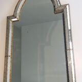 Mirror consisting of multi-faceted mirrors and brass garlands, French work, around 1970