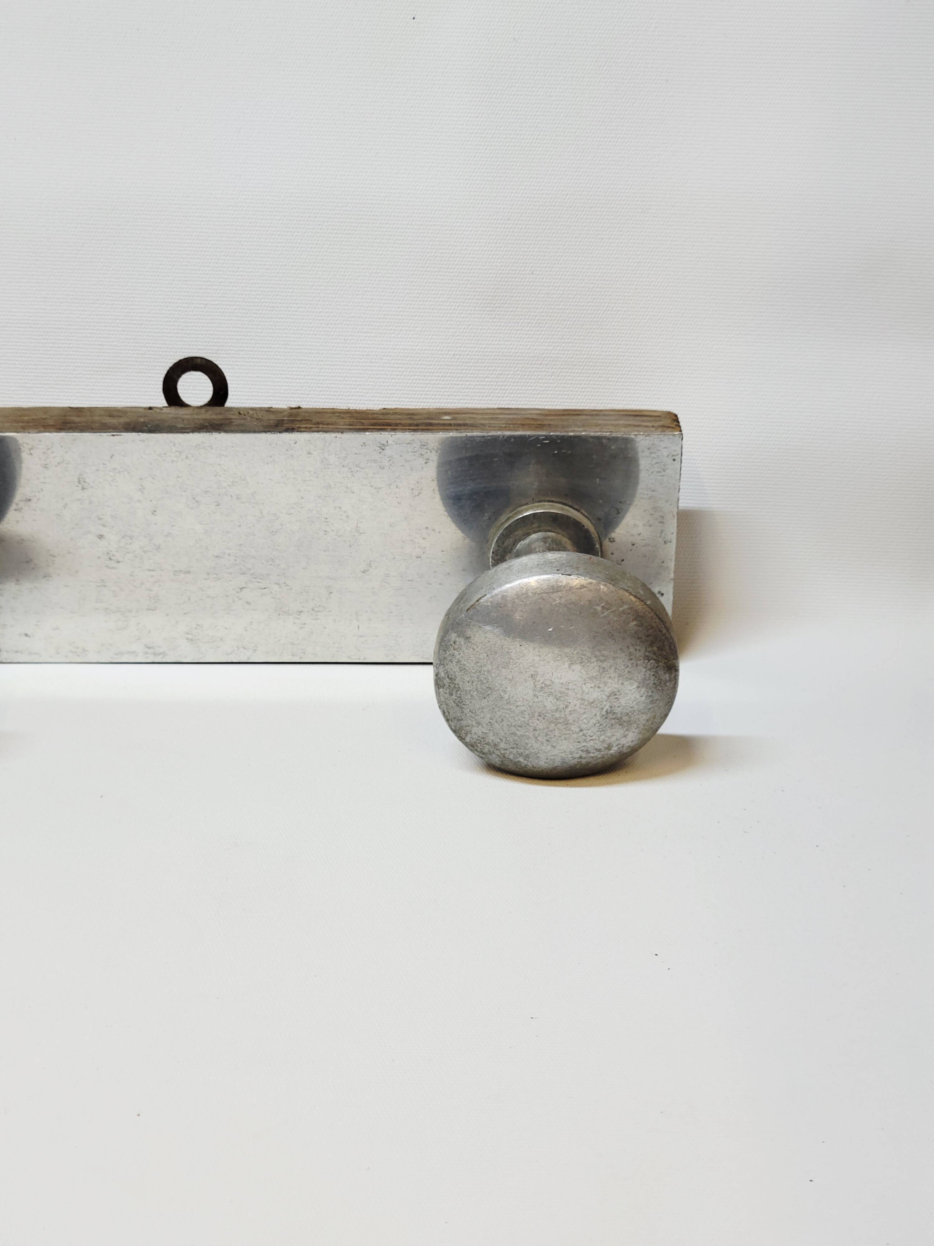 Retro vintage coat rack with 4 aluminum hooks on a wooden frame
