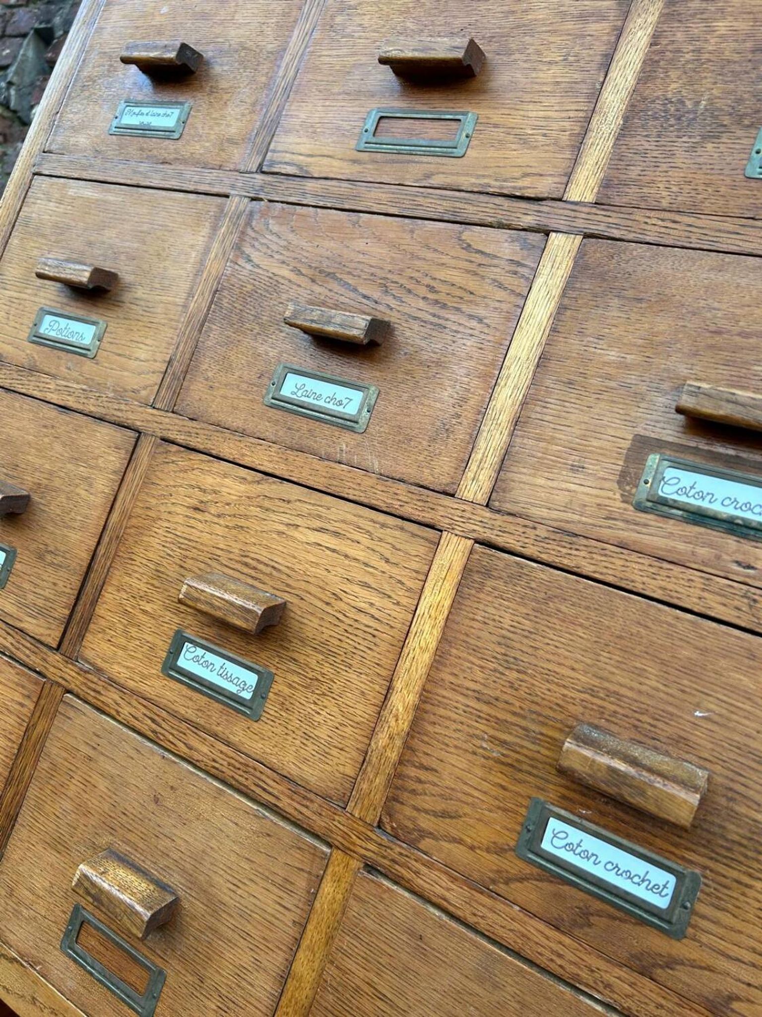 Large vintage workshop furniture with 30 drawers, antique haberdashery compartments.