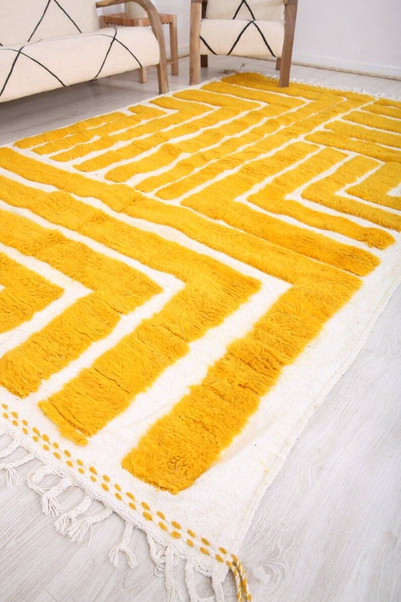 Handmade pure wool rug in traditional yellow, size 150 x 250 cm.