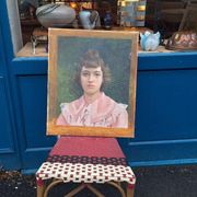 Portrait of a young bourgeois woman on canvas.