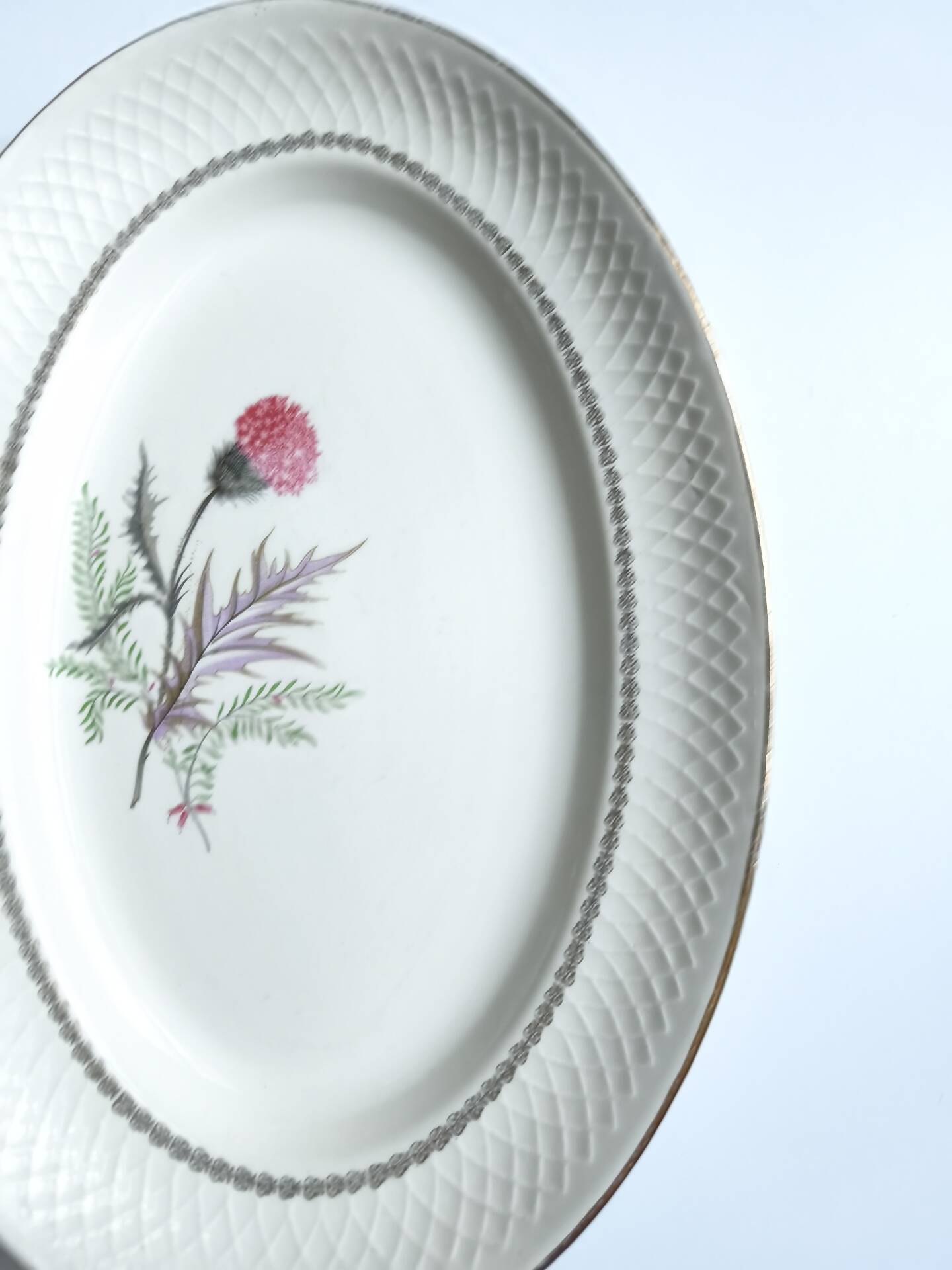 Vintage oval plate signed Moulin des Loups model Imperia pink flower