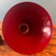 Red metal bell pendant from the 80s