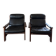Vintage Scandinavian armchairs in leather and solid wood.