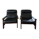Vintage Scandinavian armchairs in leather and solid wood.