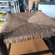 Small rustic vintage stool in wood and straw.