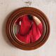 Round old wooden mirror