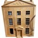 Large wooden dollhouse with miniature furniture