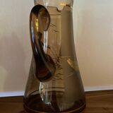Vintage smoked glass carafe with gold from the 50s/60s, featuring a marine and water skiing design.