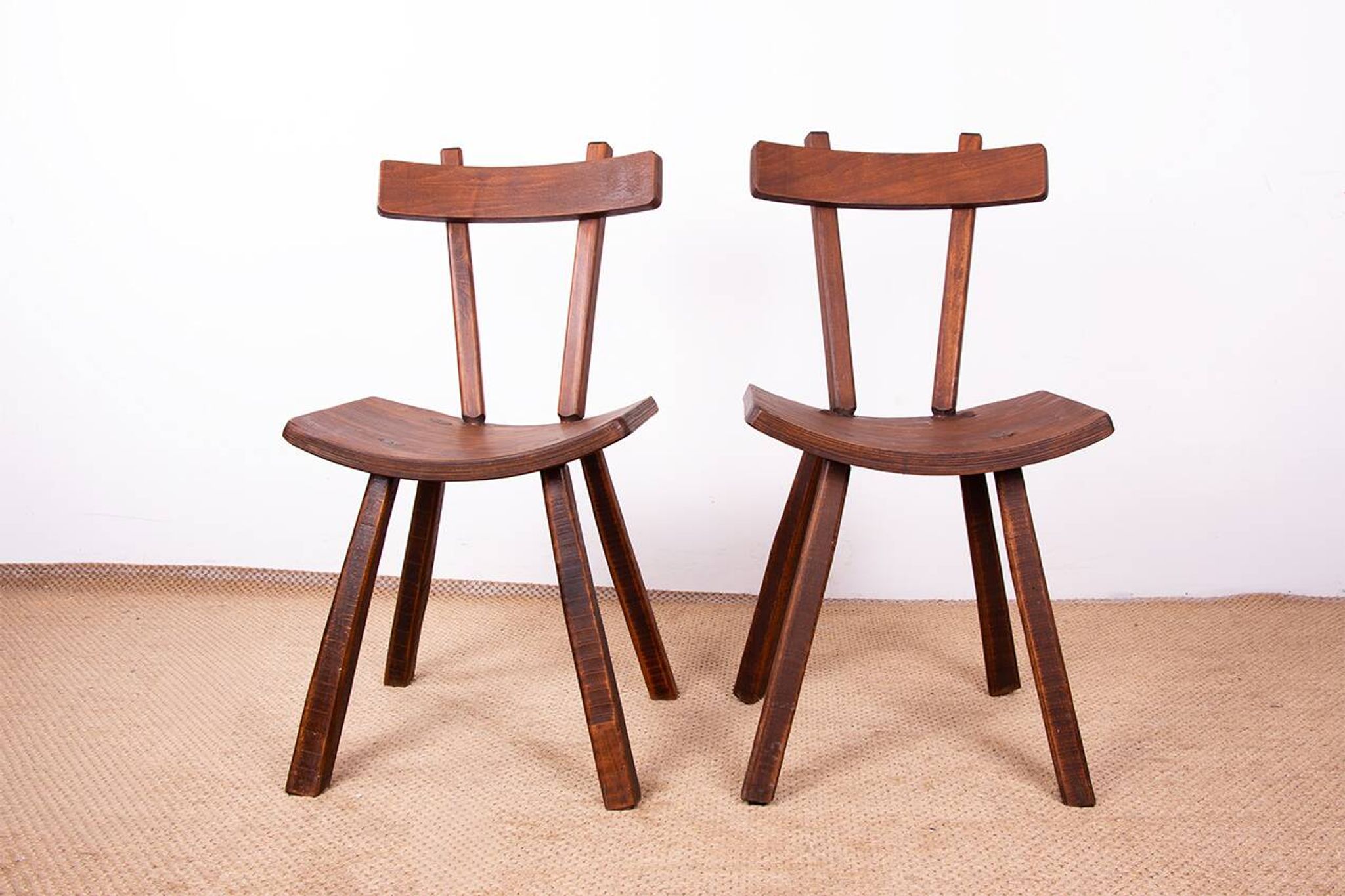 Brutalist pair of chairs in Elm in the style of Jean Touret 1950.