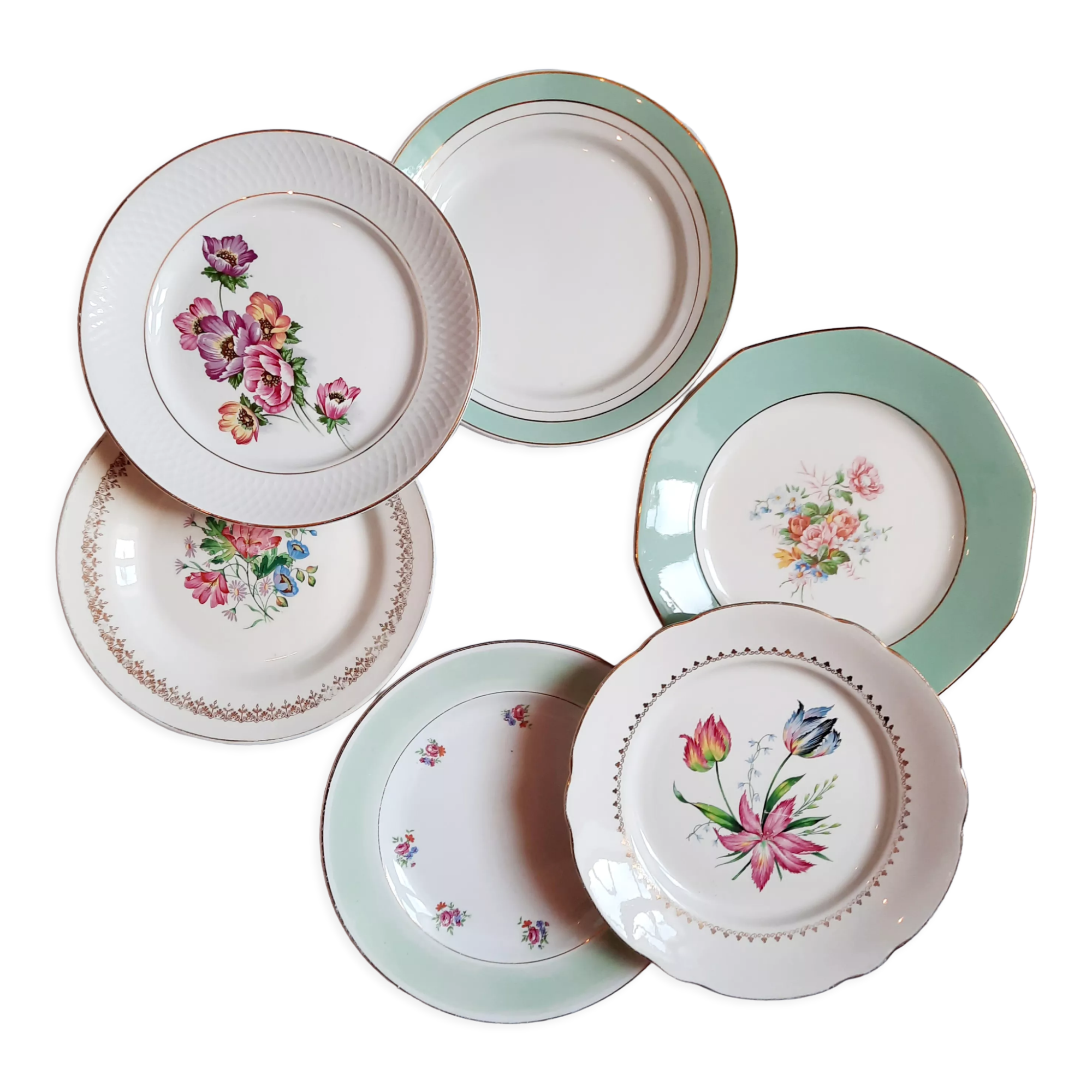 Flat antique earthenware plates with gilded edges