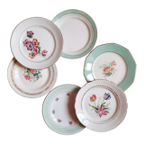 Flat antique earthenware plates with gilded edges