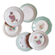 Flat antique earthenware plates with gilded edges