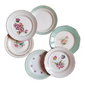 Flat antique earthenware plates with gilded edges