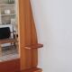 Wall mirror with a solid pine frame, integrated shelf.