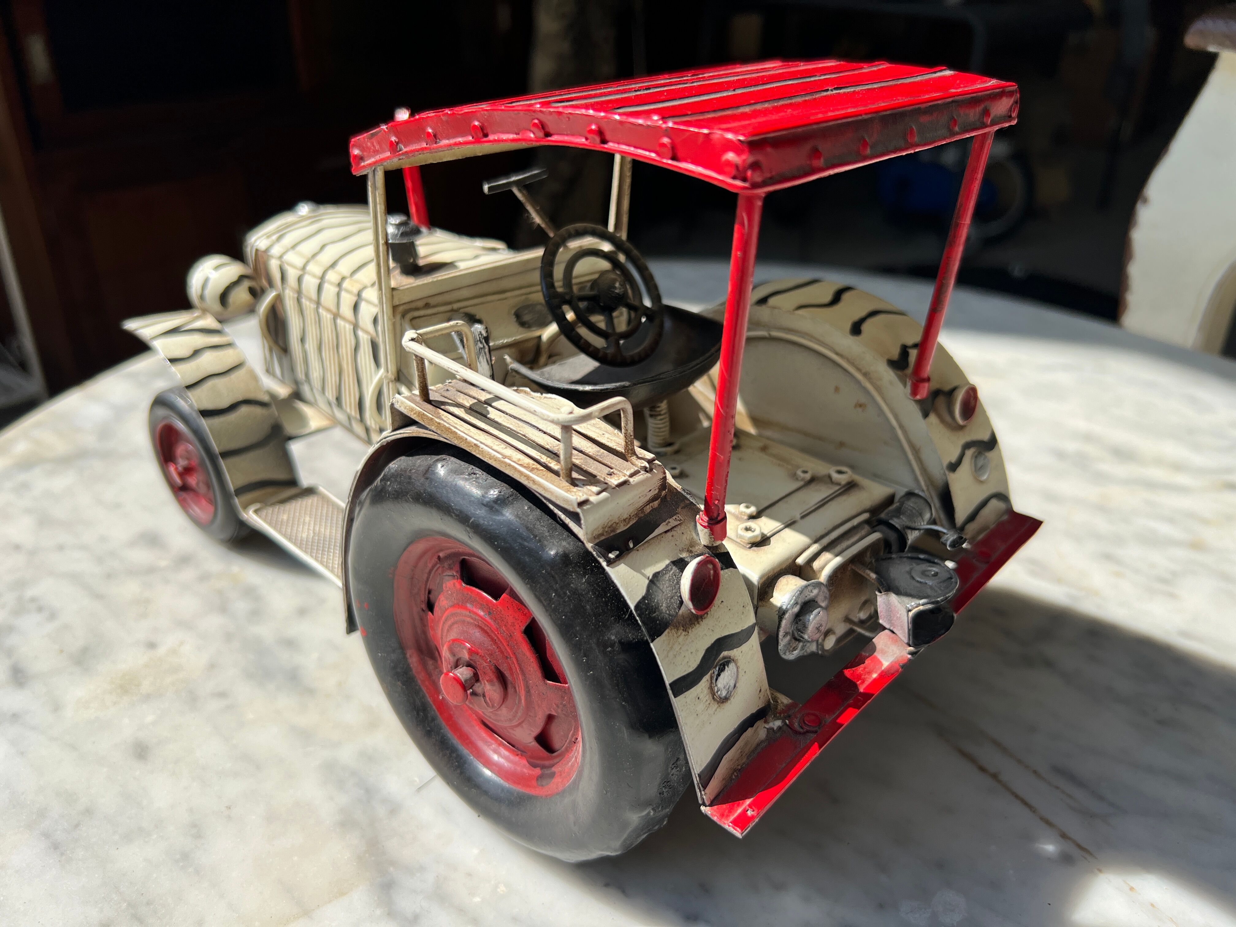 Old zebra metal tractor