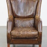 Grained cowhide armchair with a timeless design