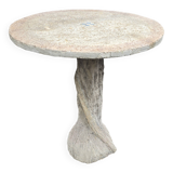 Cement garden table with trunk-shaped foot