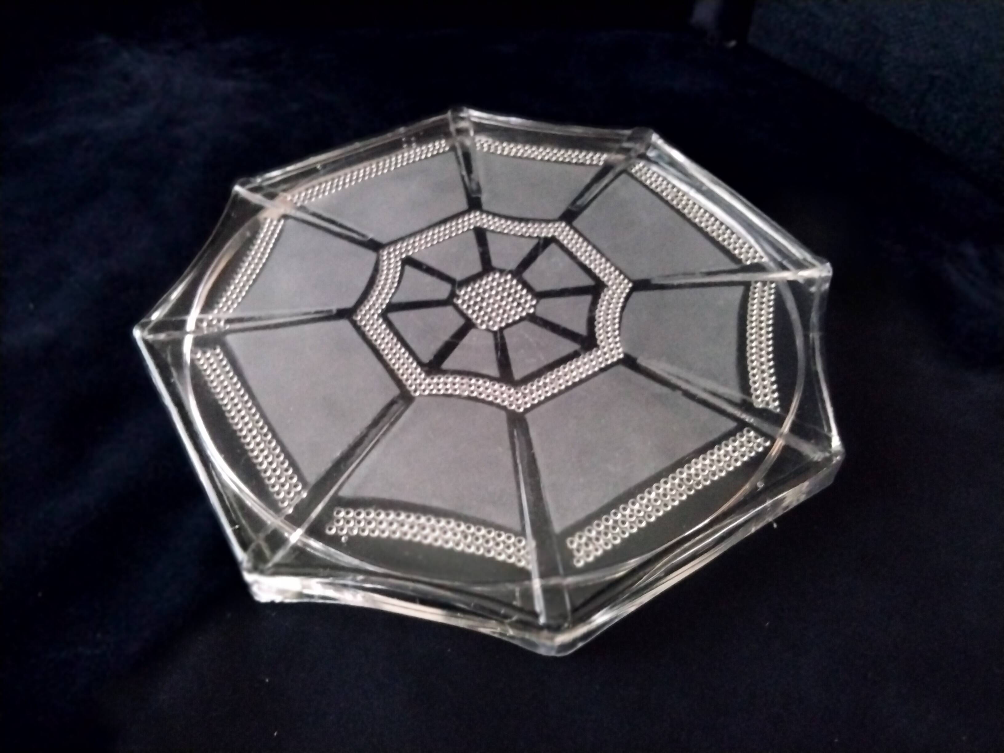 Art deco style molded pressed glass trivet