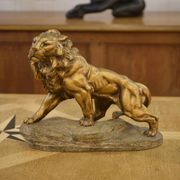 Sculpture of a lion in patinated terracotta by A. Fagotto, 1930s.