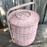 Old vintage pink rattan worker basket