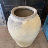 Yellow patinated cement grain jar