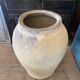 Yellow patinated cement grain jar