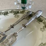 4 ironstone plates.