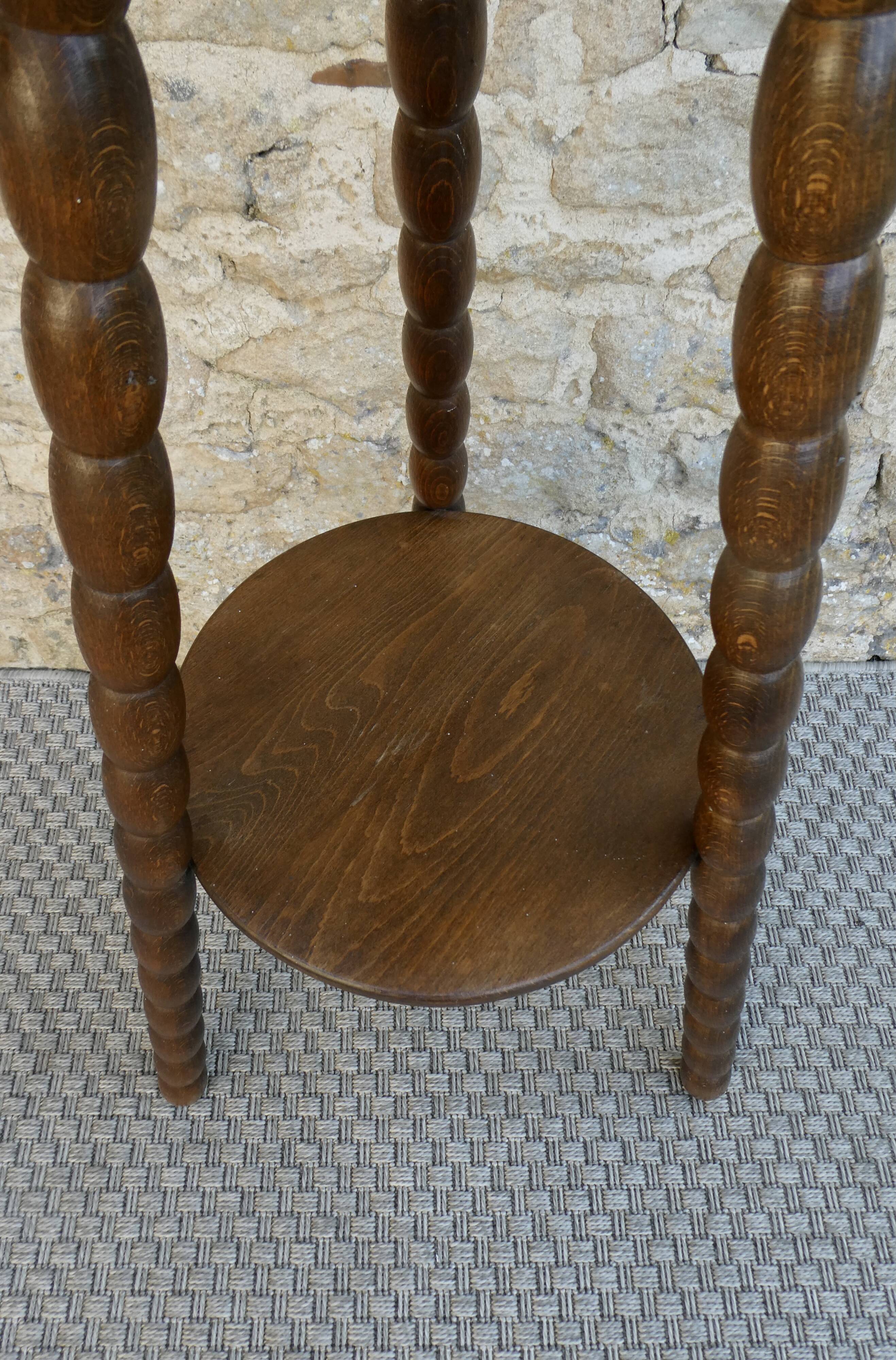 Turned wooden tripod stand