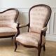 Living room set: Louis XV sofa and armchair in wood and pink fabric.