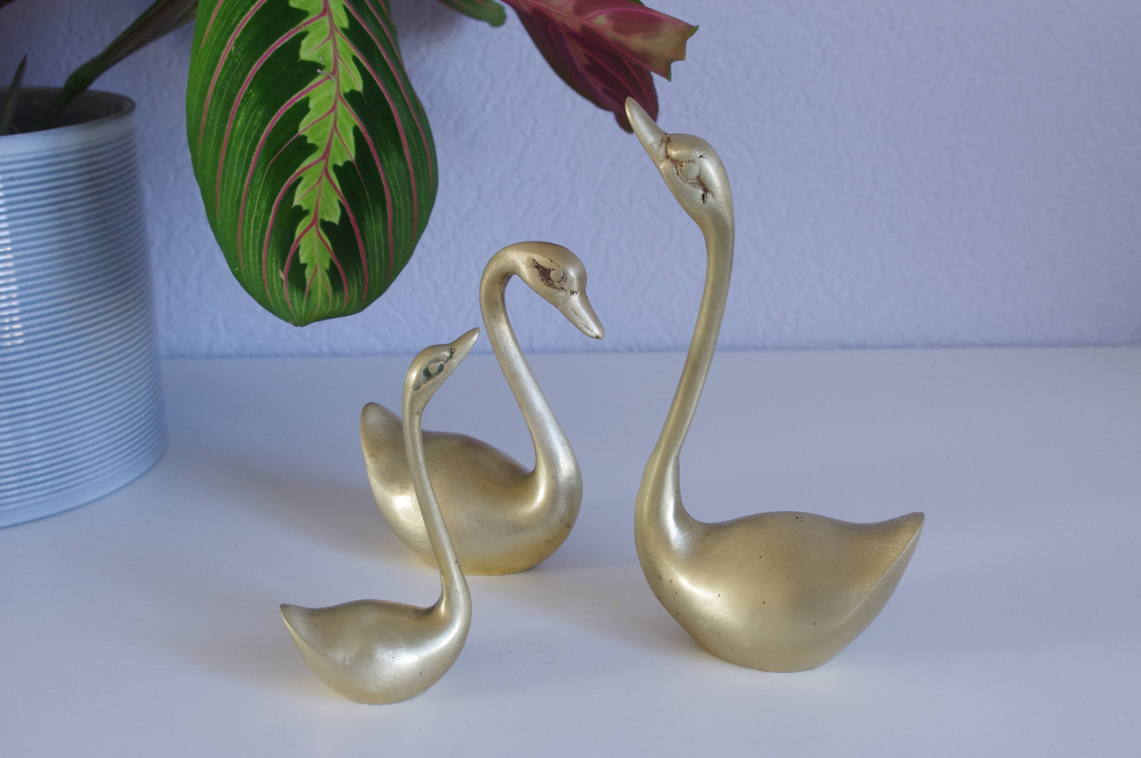 Swans or ducks brass