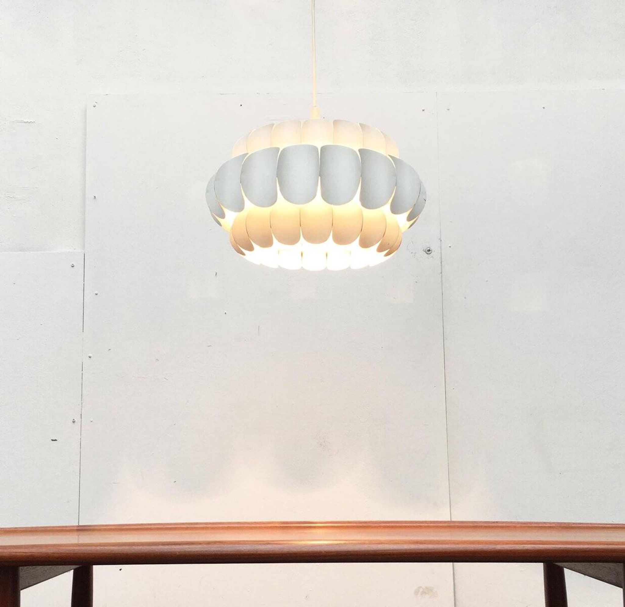 Mid-century white metal Swiss suspension by H. Zender for Temde.