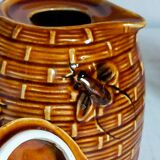 Set of old teapots and honey pot